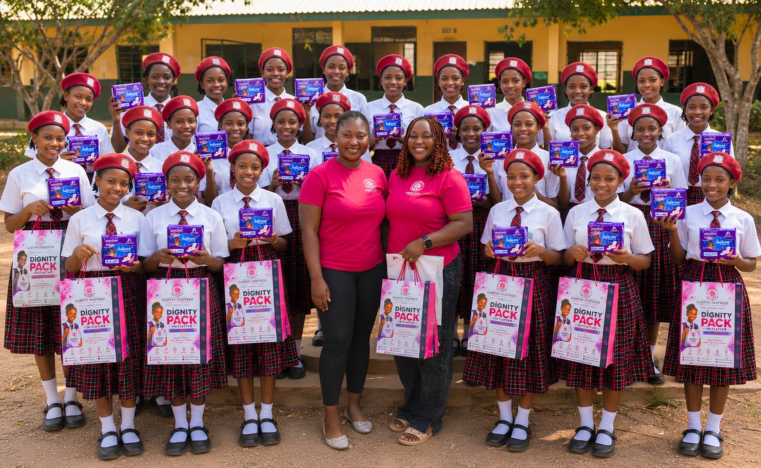 Large group of schoolgirls with Dignity Pack kits